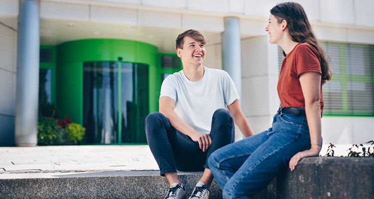 Interns break in front of the building