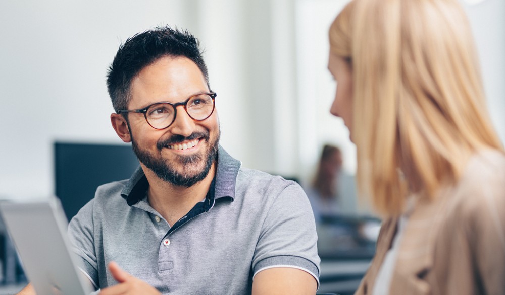 Accounting staff in conversation