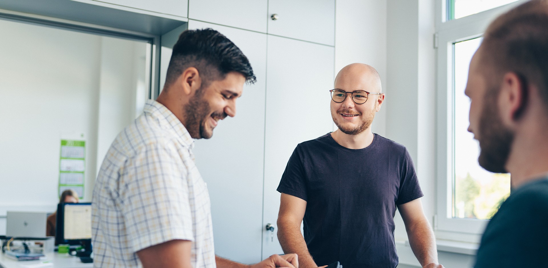 IT employees in conversation