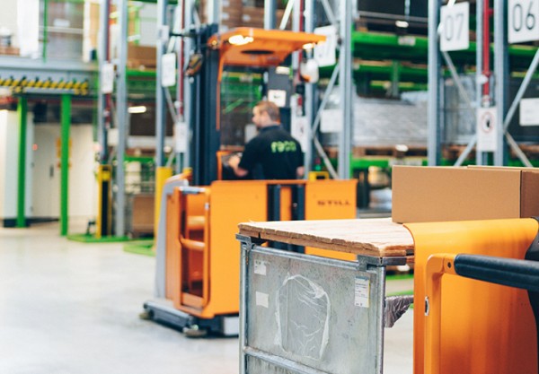 Male person works in warehouse